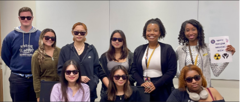 Top row is Patrick Gormley, Sierra Haun, Vi Luc, Phuong-Anh Bui, faculty members Charlie Downing and Heidy Palacios. Bottom row is Julie Nguyen, Vivian Tran, Khepera Reed-Robinson.